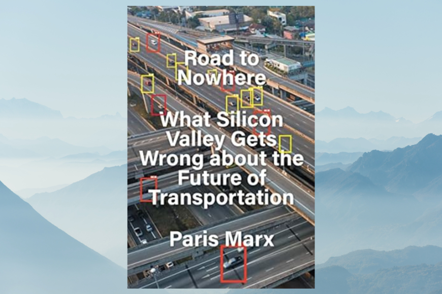 Book cover shows a busy freeway intersection with objects on the road outlined in yellow and red boxes. Title and author name are superimposed in bold white text. Book cover appears against a background of mountains in blue light with haze or fog in foreground.