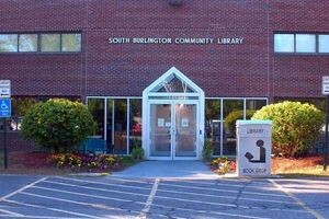 Entrance of the original library with book drop in photo