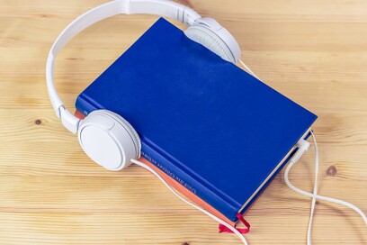 book with headphones