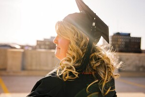 Woman wearing a cap and gown